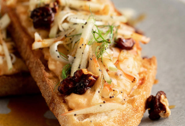 Agrumato Toast with Calabrian Chili Olive Oil White Bean Spread, Fennel and Apple