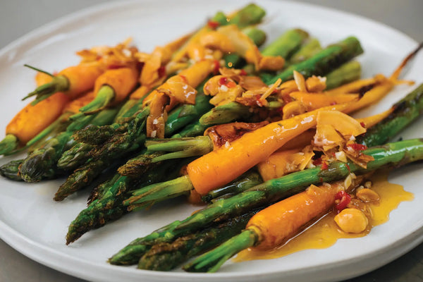 Blistered Baby Carrots and Asparagus with Cashew-Chili Sauce